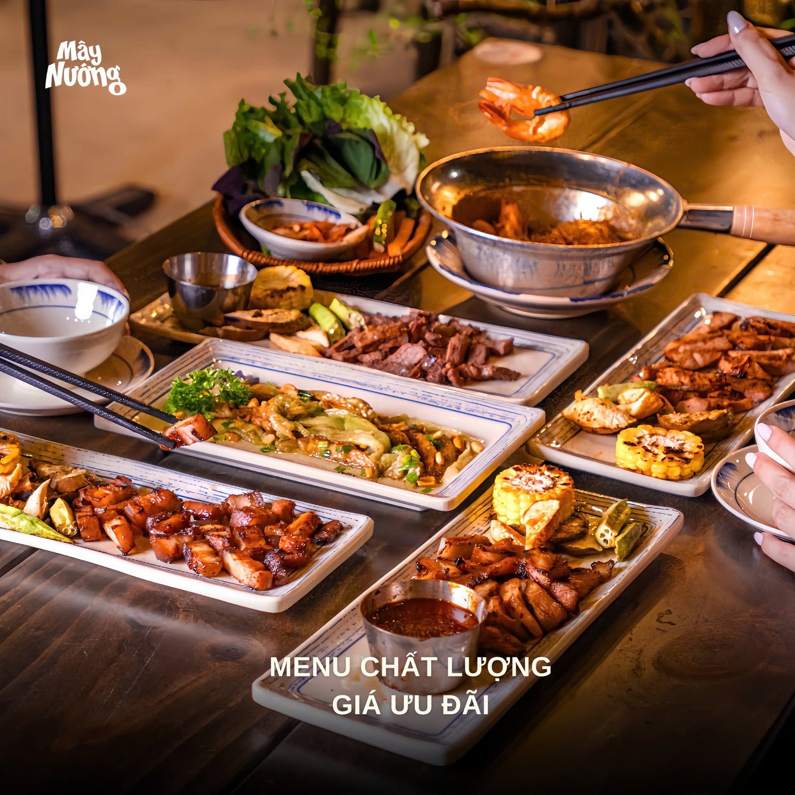 Bàn món nướng và món ăn kèm tại Mây Nướng Restaurant